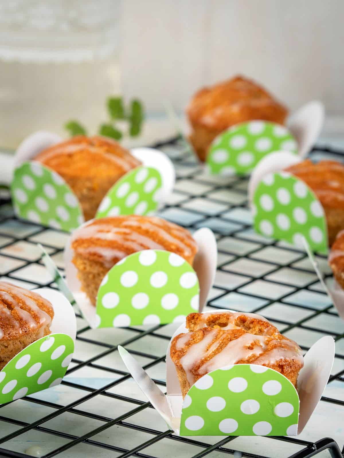 Vegan Gluten Free carrot cupcakes in lime green polka dot cupcake holders.