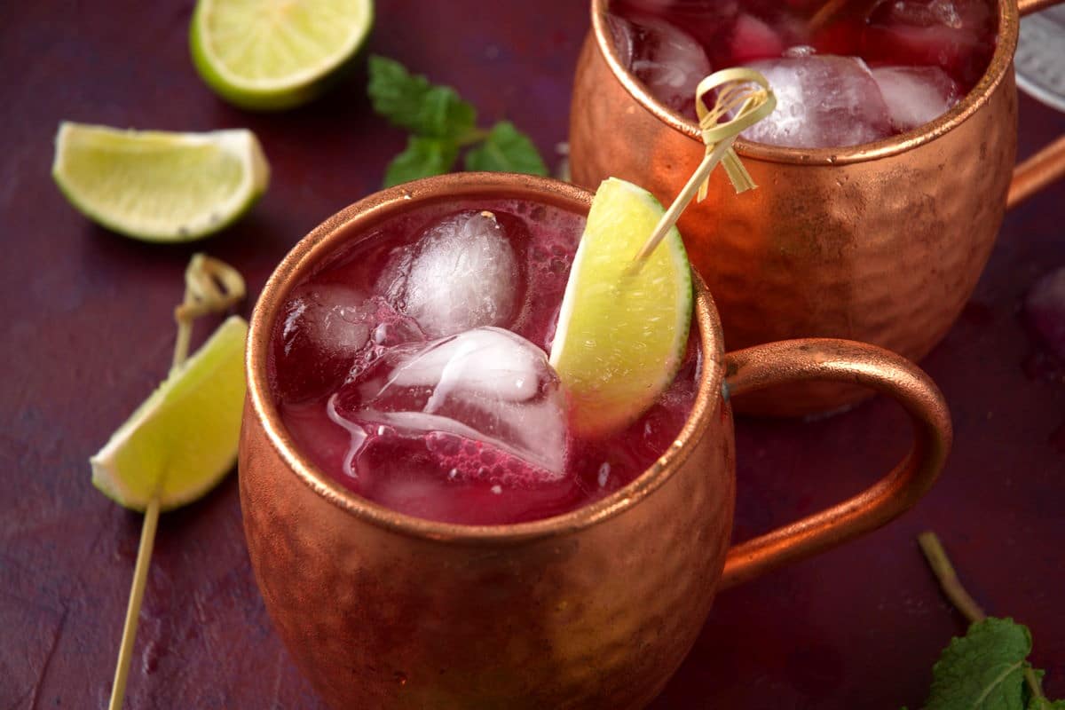 Virgin Moscow Mule in copper mugs with lime wedge.