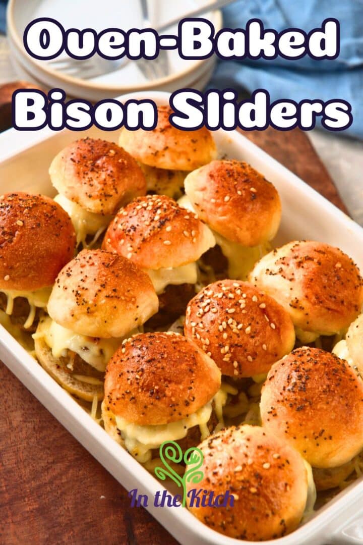 Bison sliders in casserole dish with text overlay that says 'oven-baked bison sliders'.