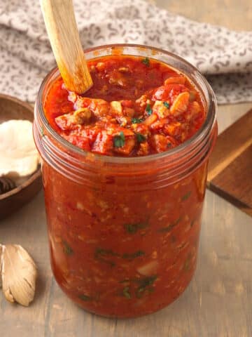 Bison chanterelle mushroom meat sauce in jar.
