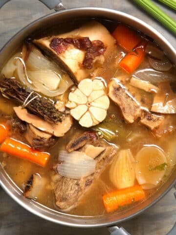 Bison bone broth in large pot.