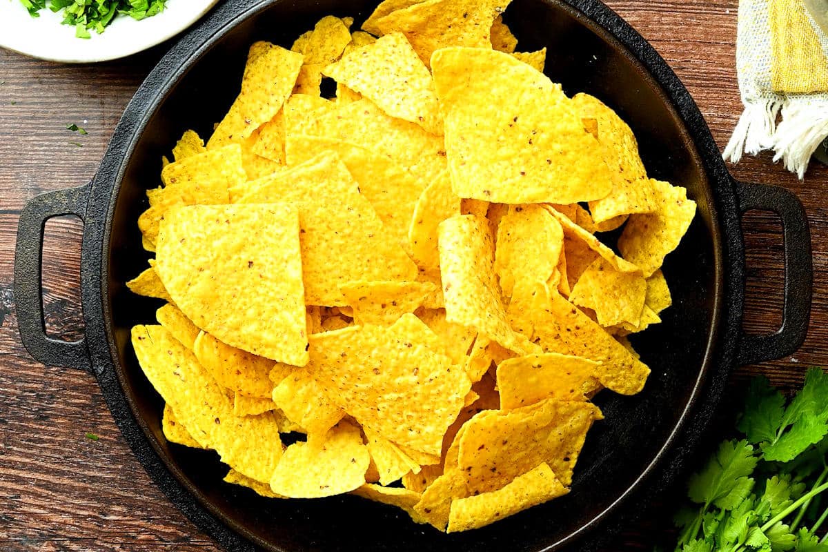 Tortilla chips in cast iron pan.