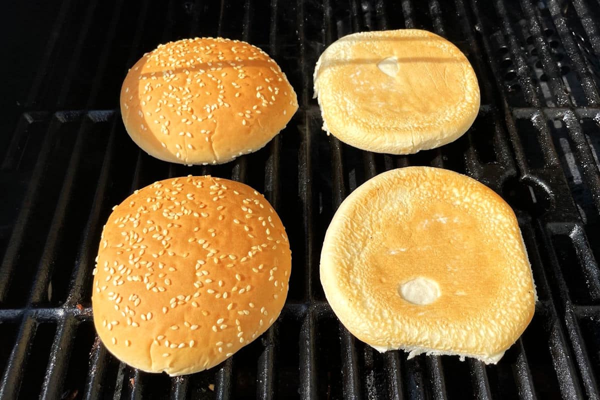 Hamburger buns on the outdoor grill.