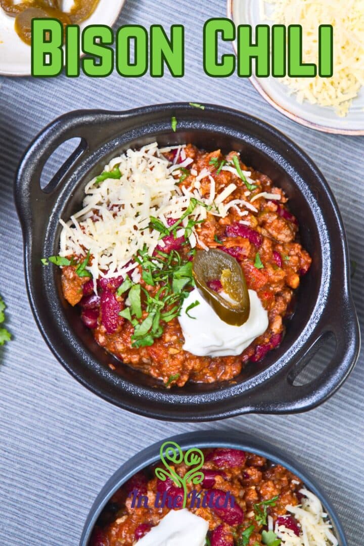 Bison chili in cast iron dish with text overlay that says 'bison chili'.