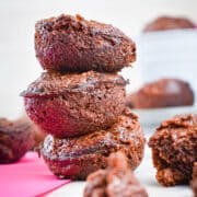 Mini brownie bites stacked on top of each other.