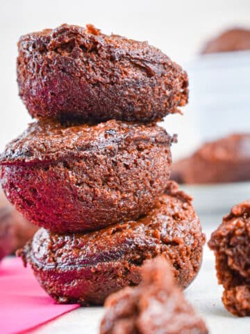 Mini brownie bites stacked on top of each other.