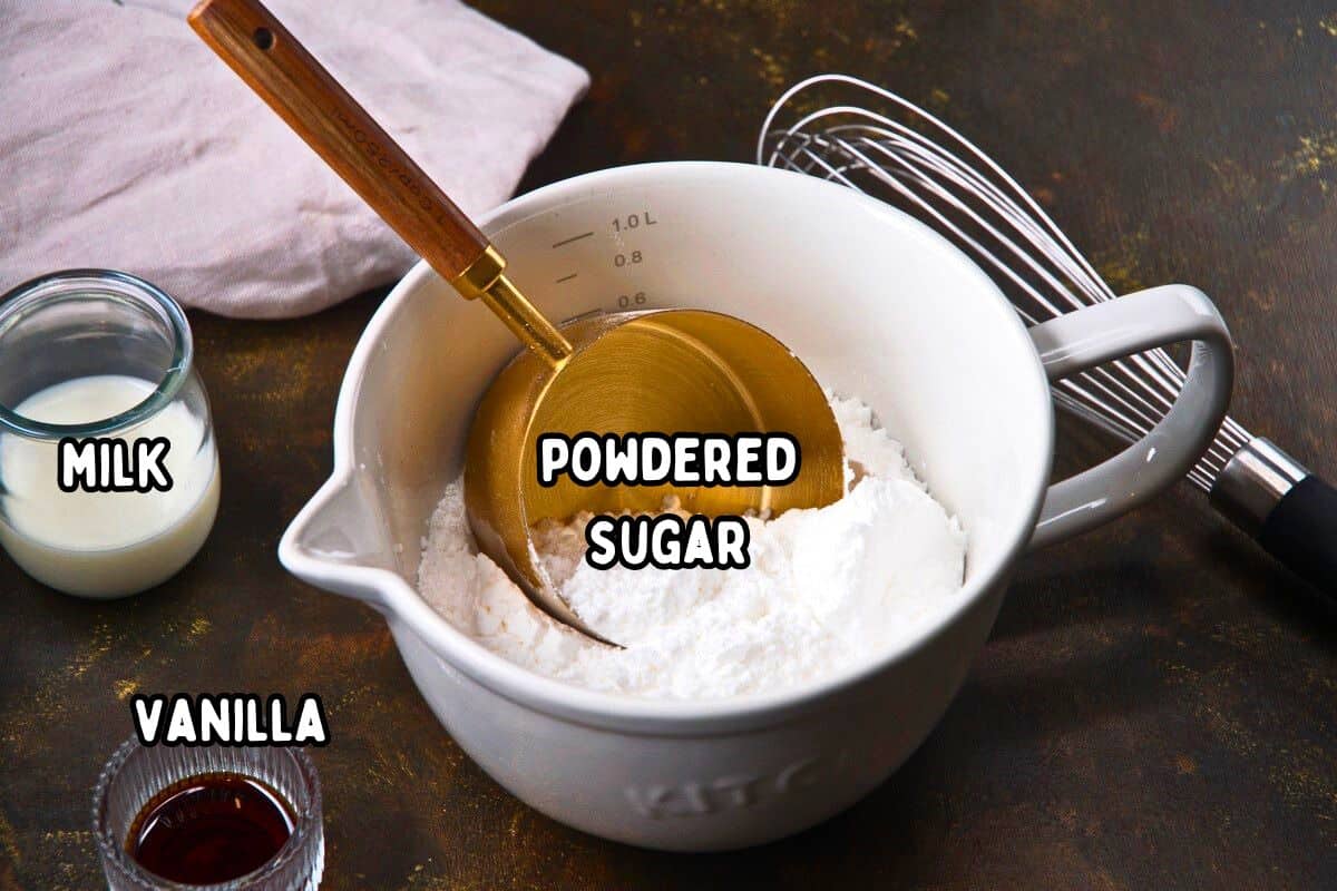 Cake pop icing ingredients prepped and labeled on brown background.