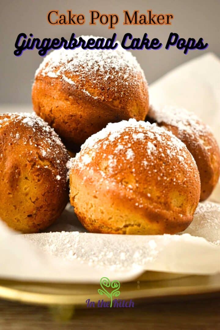 Gingerbread cake pops with icing sugar dusting on parchment.