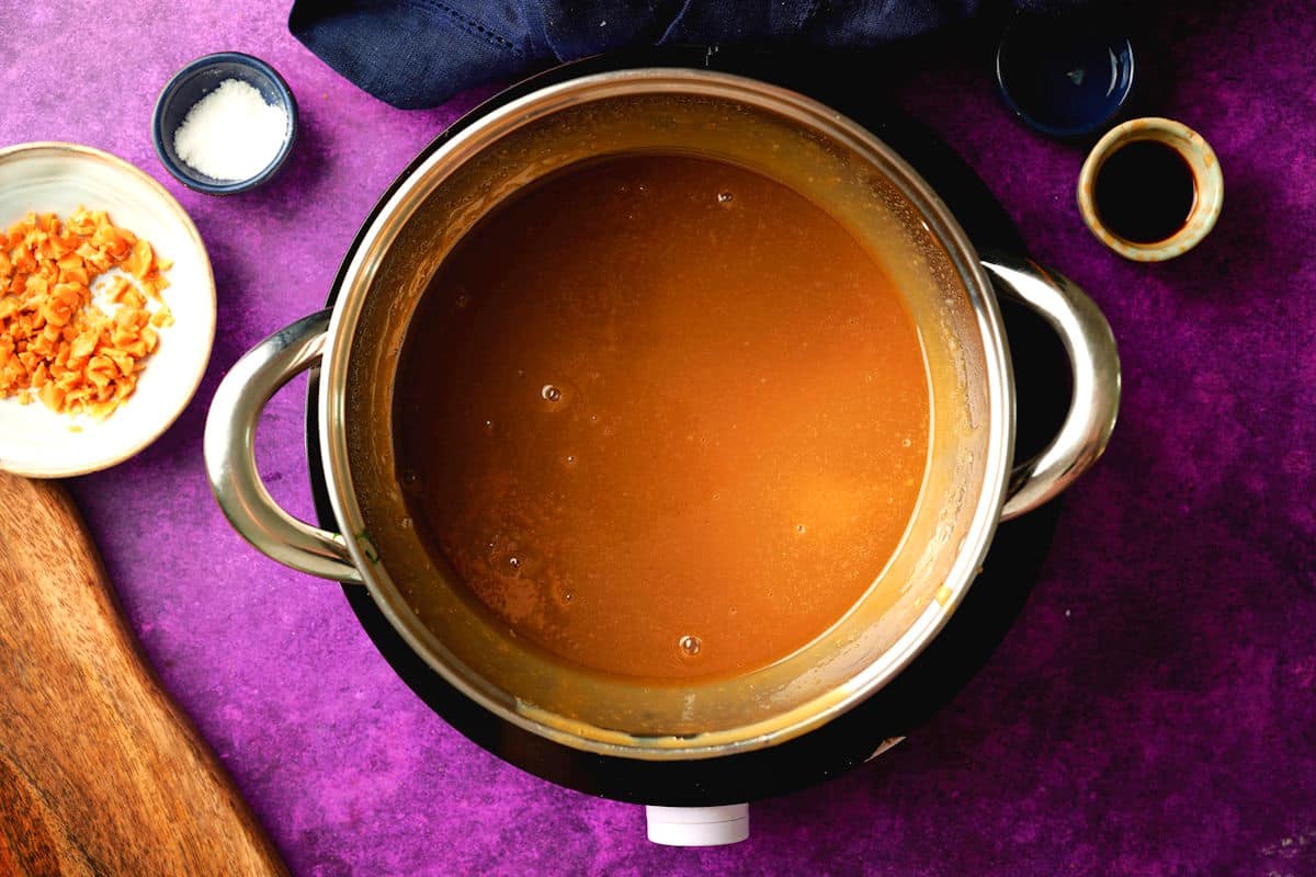 Caramel brulee sauce in pot.