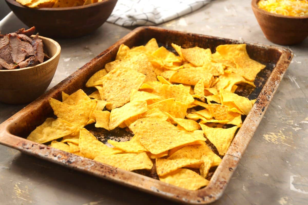 Tortilla chips on sheet pan.