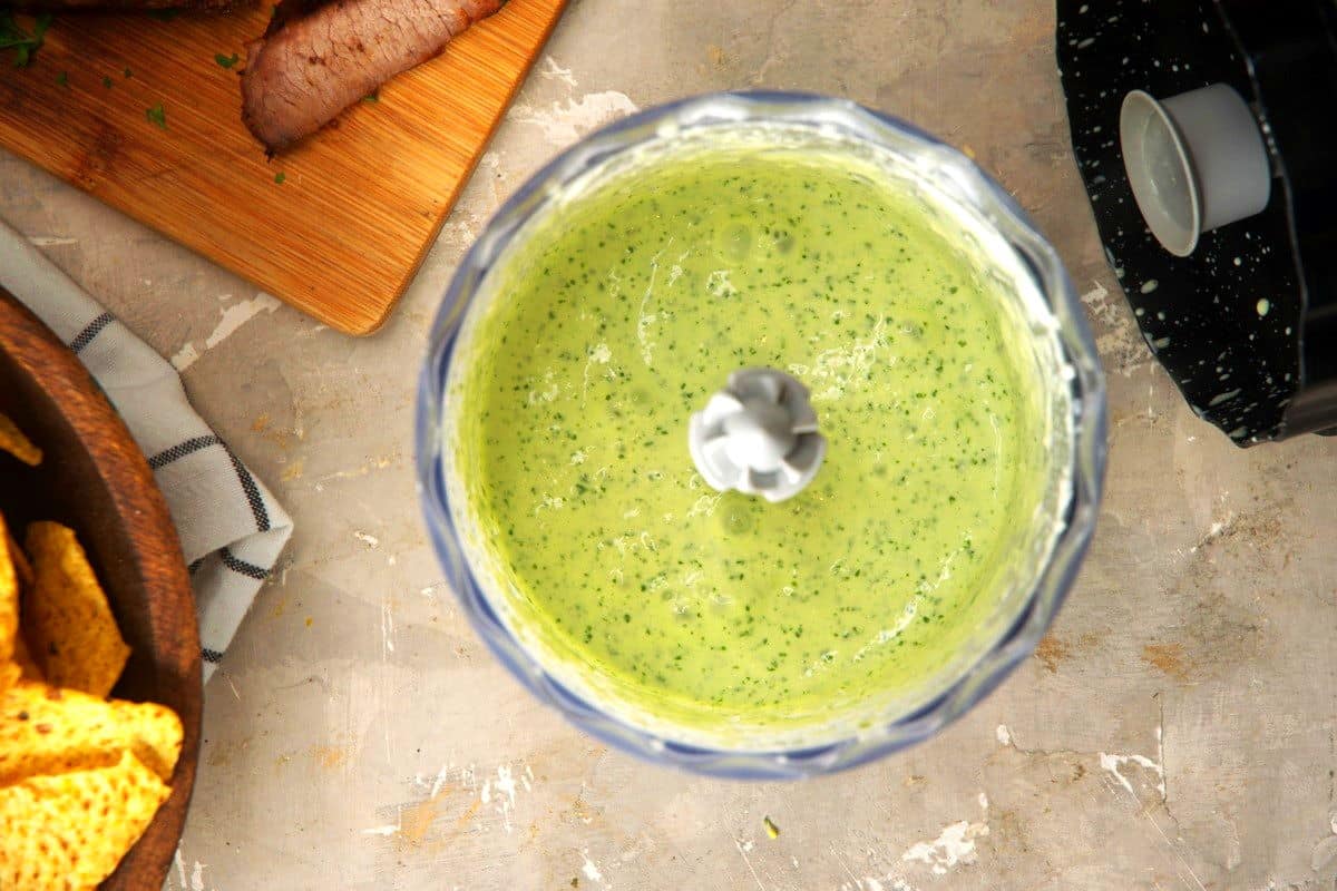 Cilantro dip blended in food processor.
