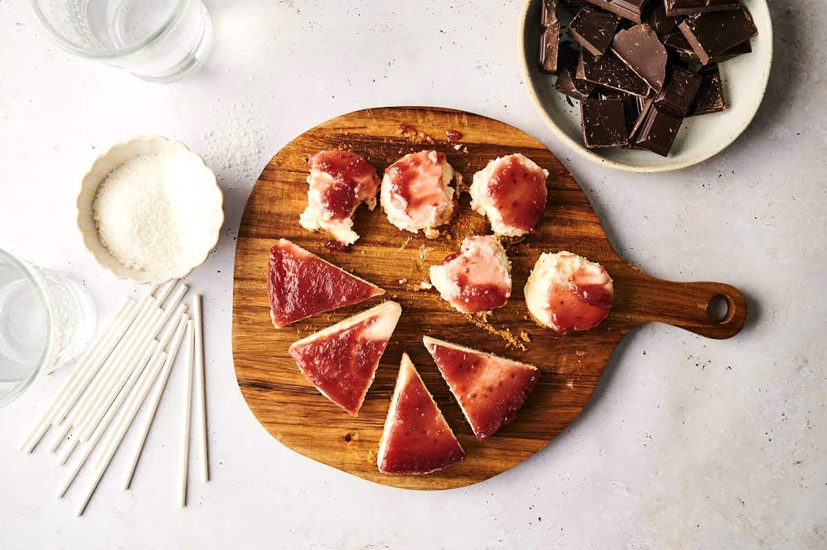 Cheesecake cut into triangles and balls.