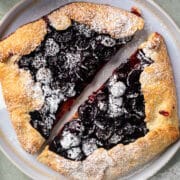 Cherry galette dusted with icing sugar.