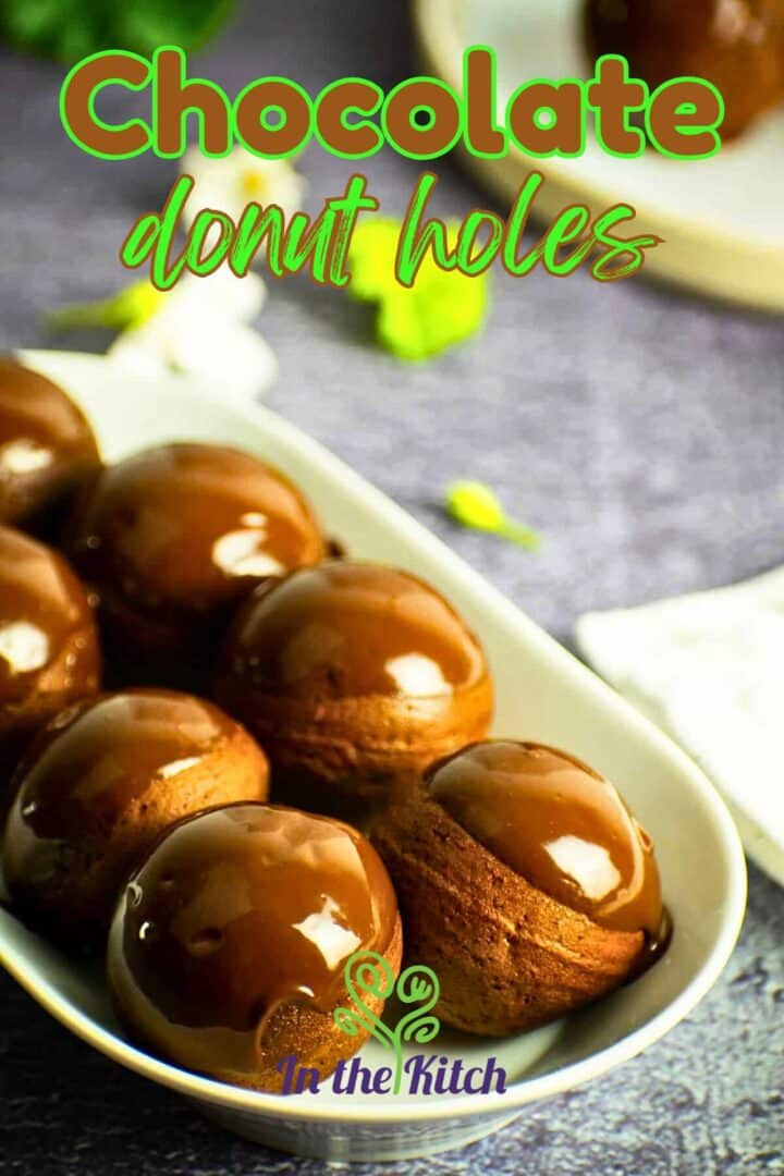 Chocolate covered donut holes in serving dish with text overlay that says 'Chocolate Donut Holes'.