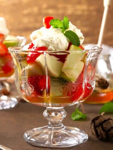 Fruit salad in dessert glass.
