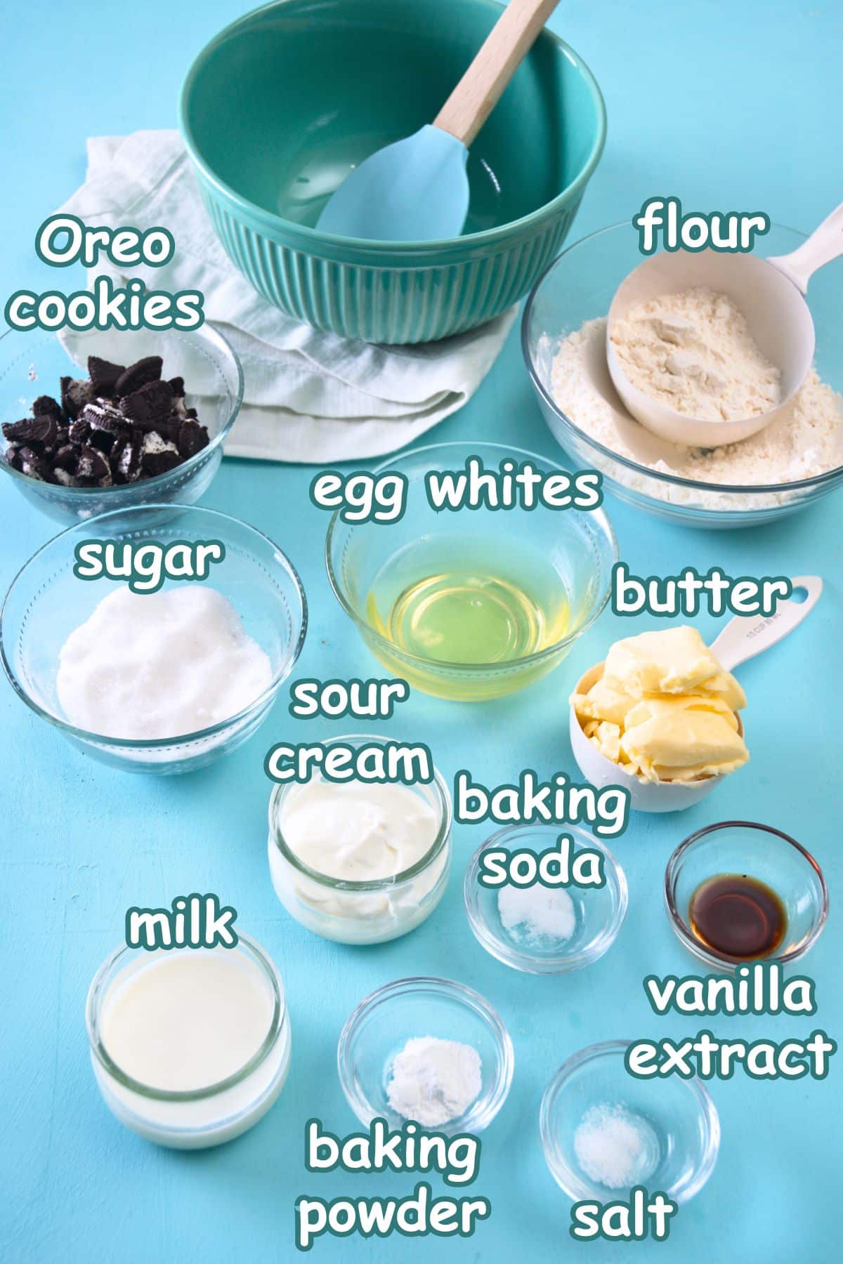 Cookies and cream cake pop ingredients labeled on blue background.