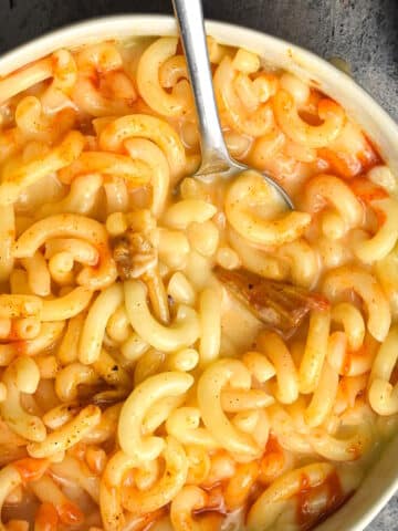Kimchi mac and cheese in a bowl.