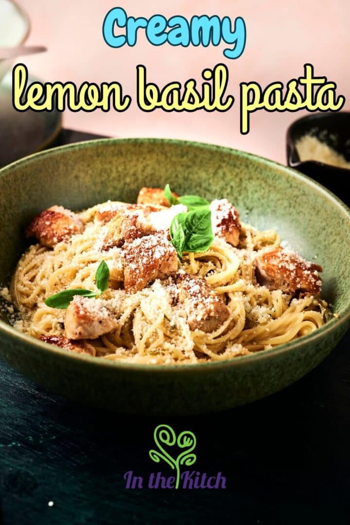 Lemon basil pasta in green pasta bowl with text overlay that says 'creamy lemon basil pasta'.