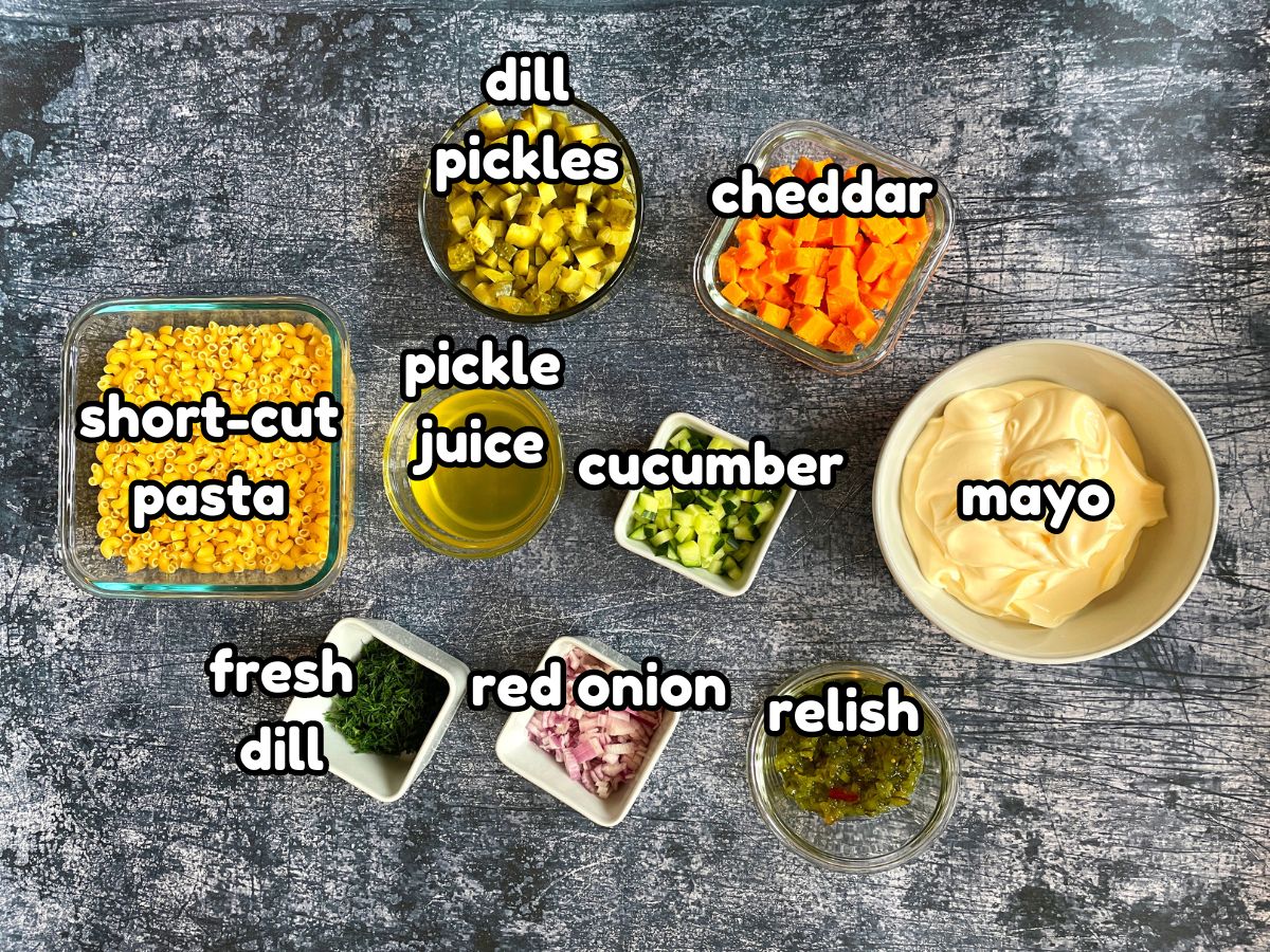 Dill pickle pasta salad ingredients prepped and labeled.