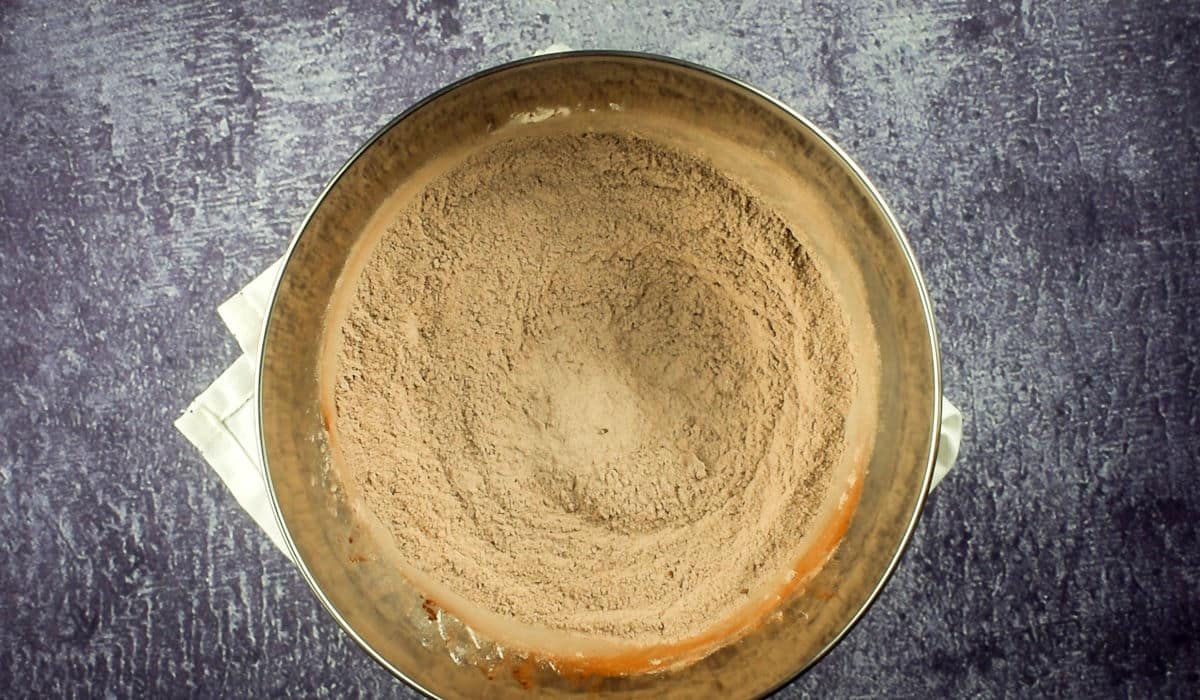 Donut hole dry ingredients in bowl.