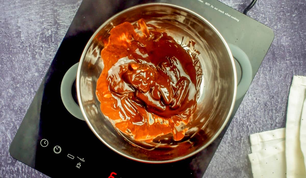Melted chocolate in bowl.