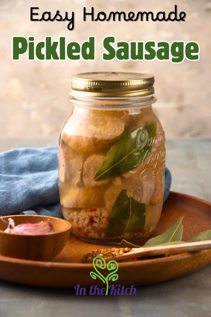 Pickled sausage in a jar with text overlay that says 'easy homemade pickled sausage'.