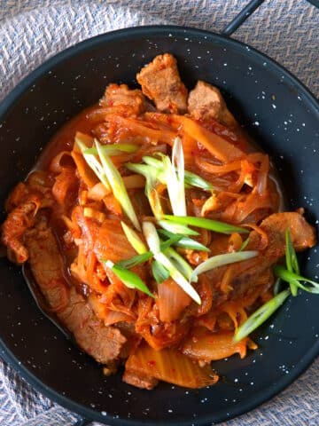 Kimchi beef stew in Asian bowl.
