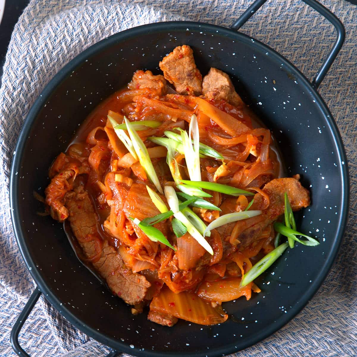 Kimchi beef stew in Asian bowl.