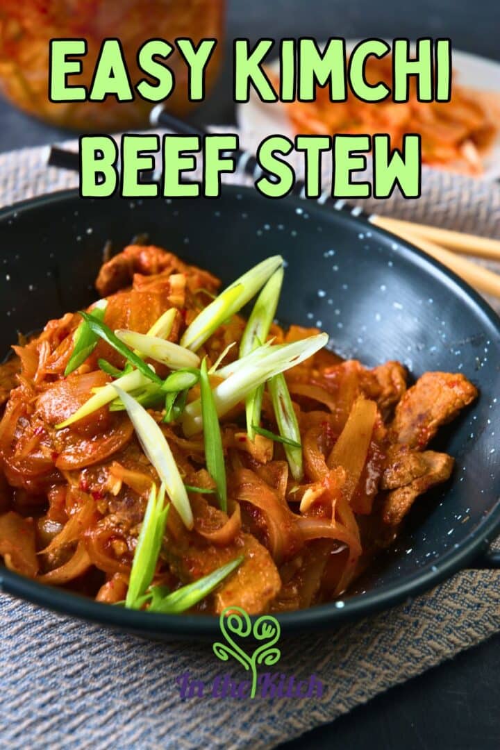 Kimchi stew in black bowl with text overlay that says 'easy kimchi beef stew'.