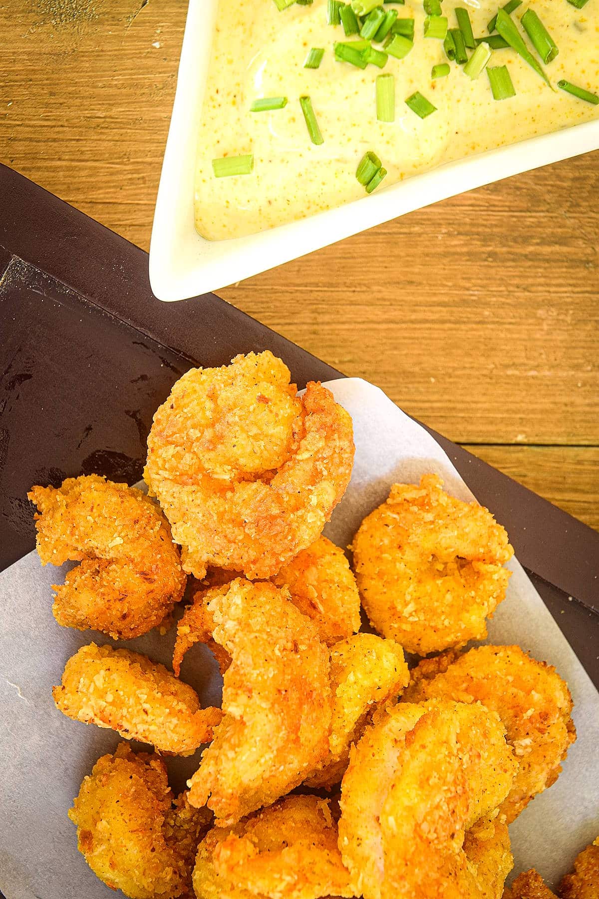 Coconut shrimp with a curry dip on the side.