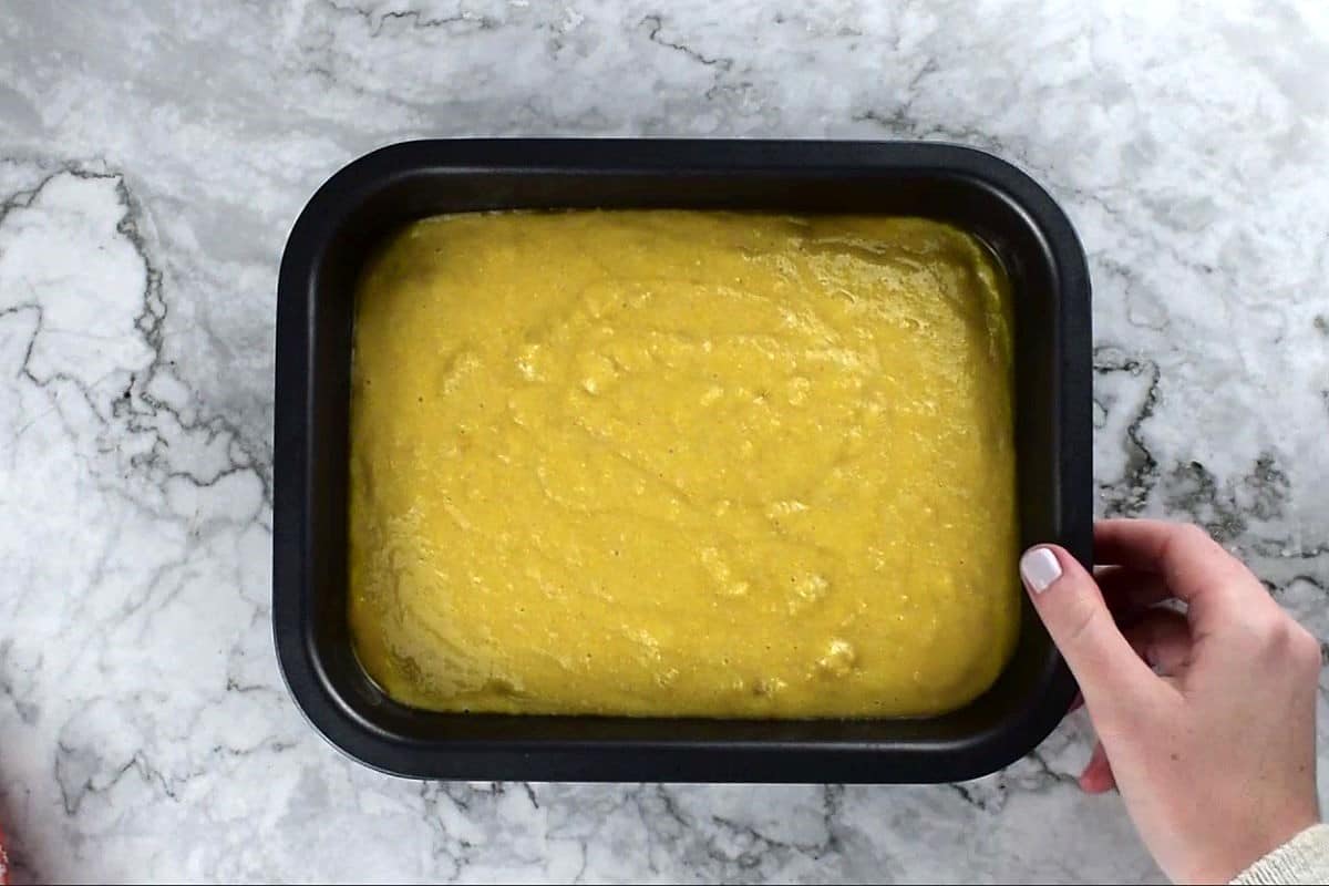 Cornbread batter in baking dish.