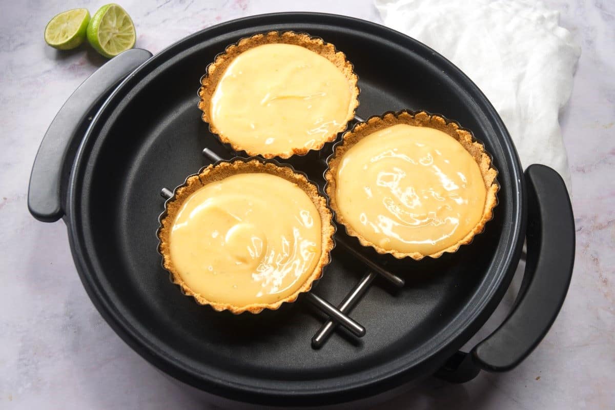 Raw key lime pies in electric skillet.