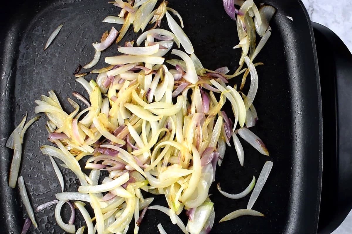 Onions in an electric skillet.