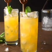 Fog cutter cocktail in tall glasses.