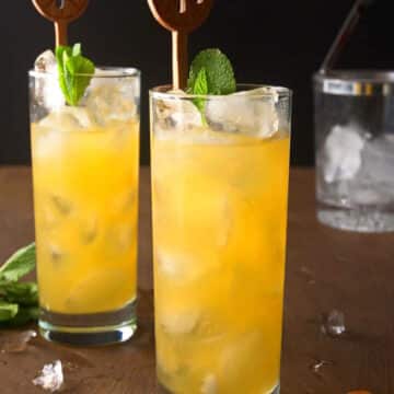 Fog cutter cocktail in tall glasses.