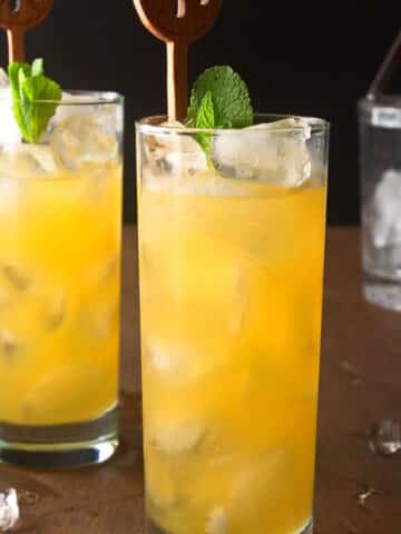 Fog cutter cocktail in tall glasses.