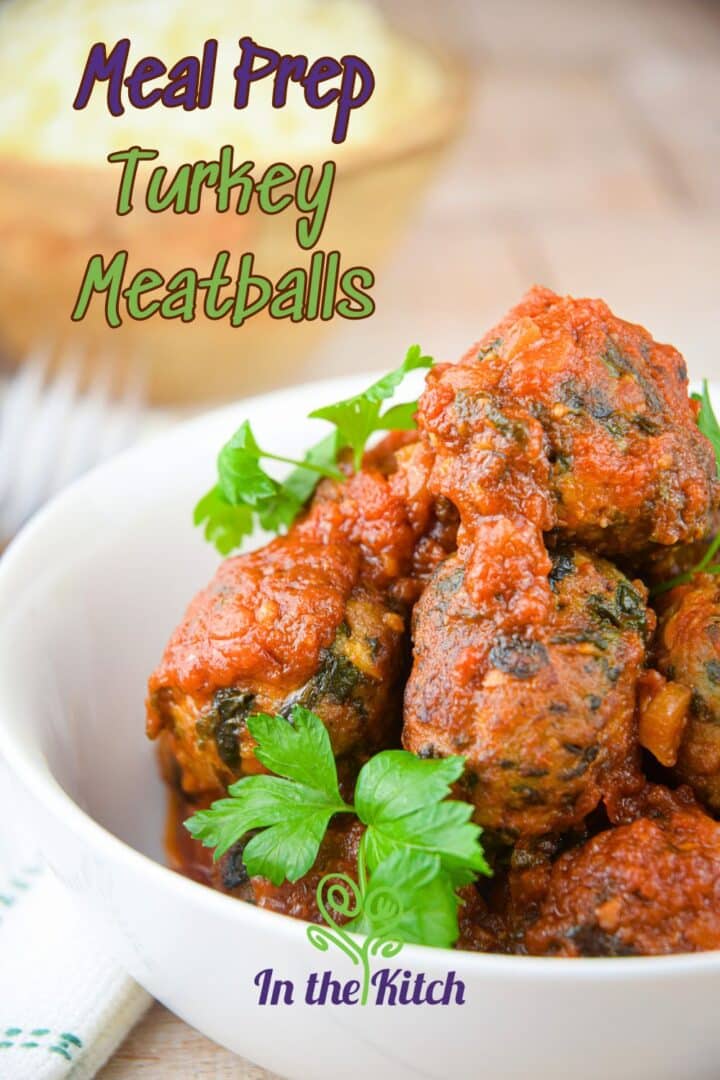 Turkey meatballs and tomato sauce in bowl with text overlay that says 'meal prep turkey meatballs'.