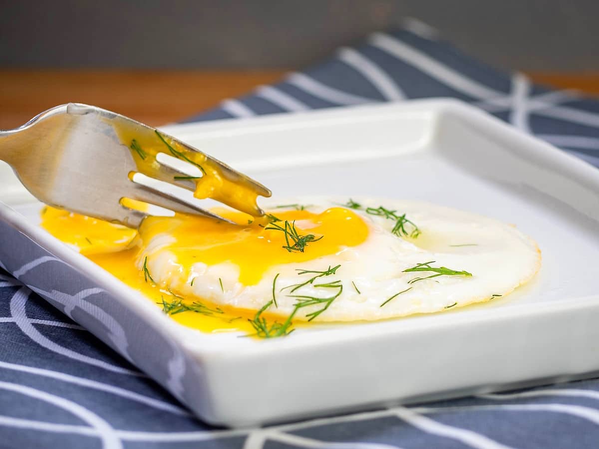 Runny egg with freshly chopped dill.