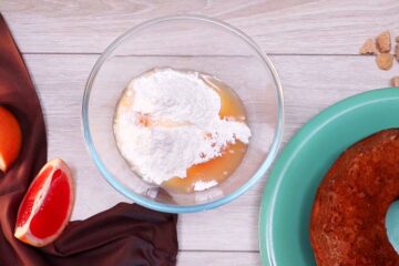 Grapefruit juice and icing sugar in bowl.