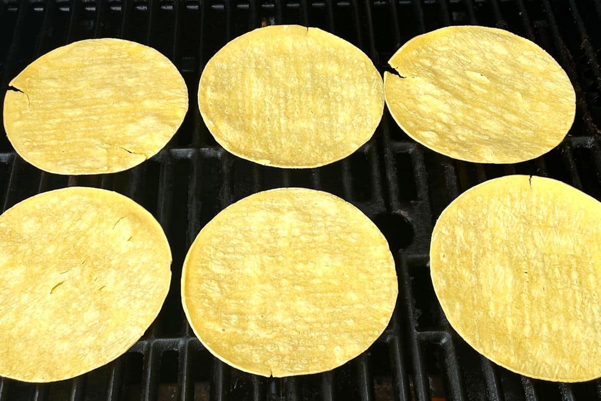 Corn tortillas on the outdoor grill.
