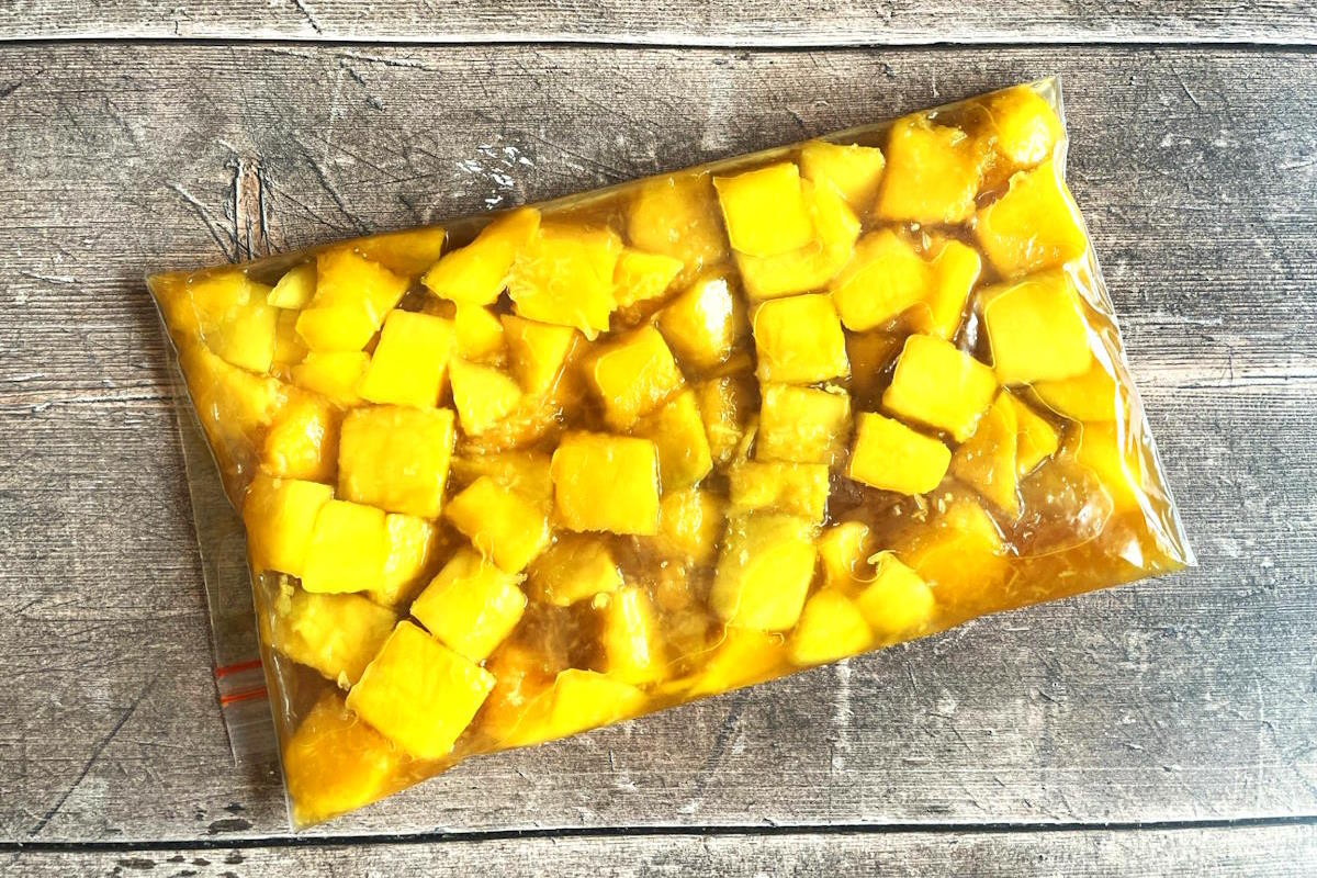 Mango cubes in marinade.