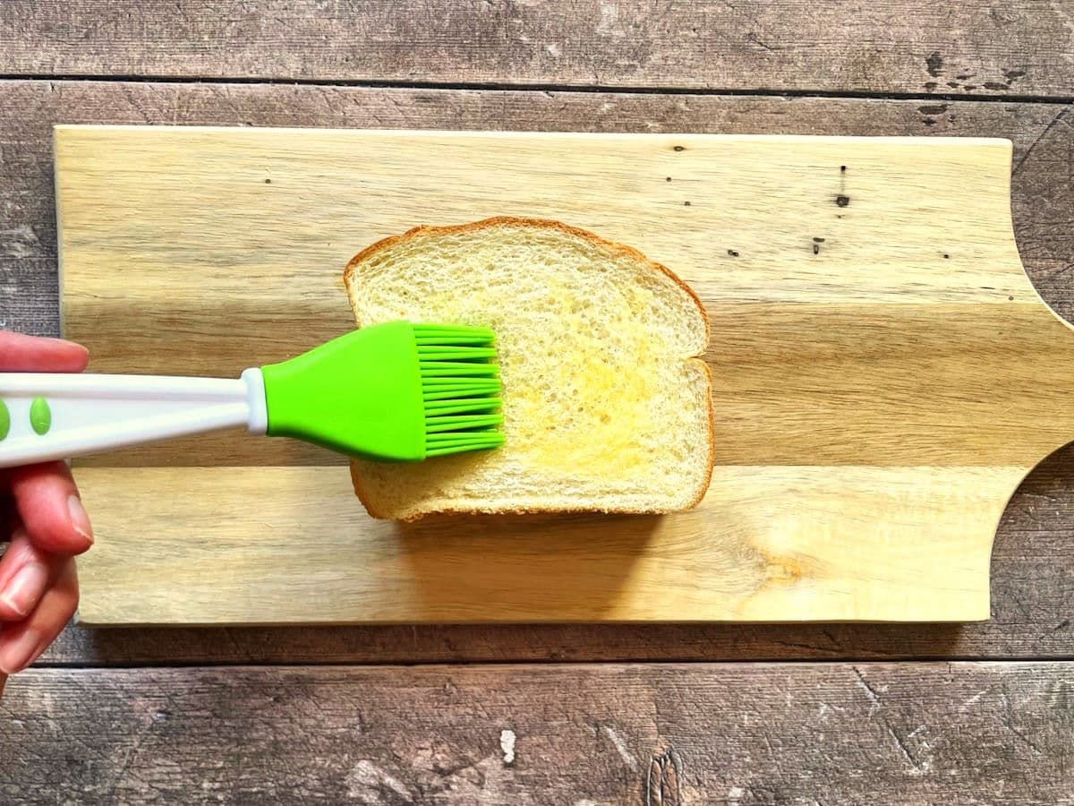 Bread brushed with melted butter.