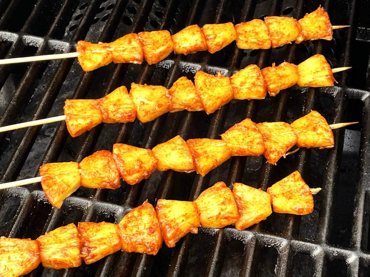 Pineapple skewers on the outdoor grill.