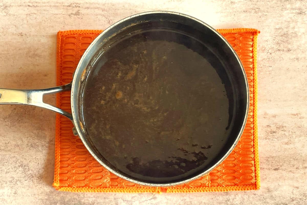 Pumpkin spice syrup in saucepan.