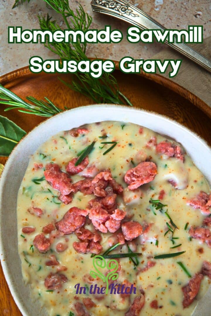 Sawmill gravy in bowl with text overlay that says 'homemade sawmill sausage gravy'.