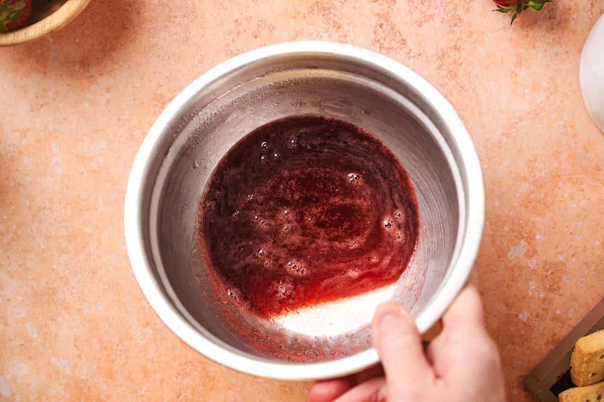 Strawberry syrup in bowl.