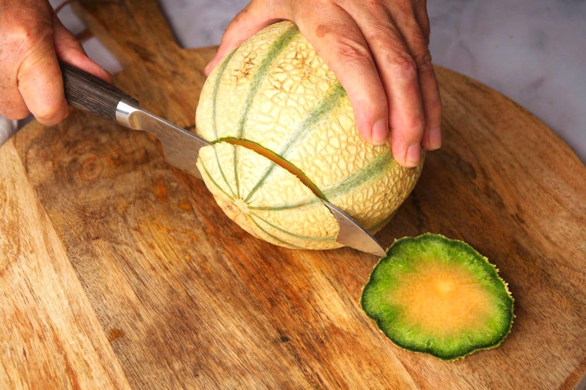 Cantaloupe getting top and bottom cut off.