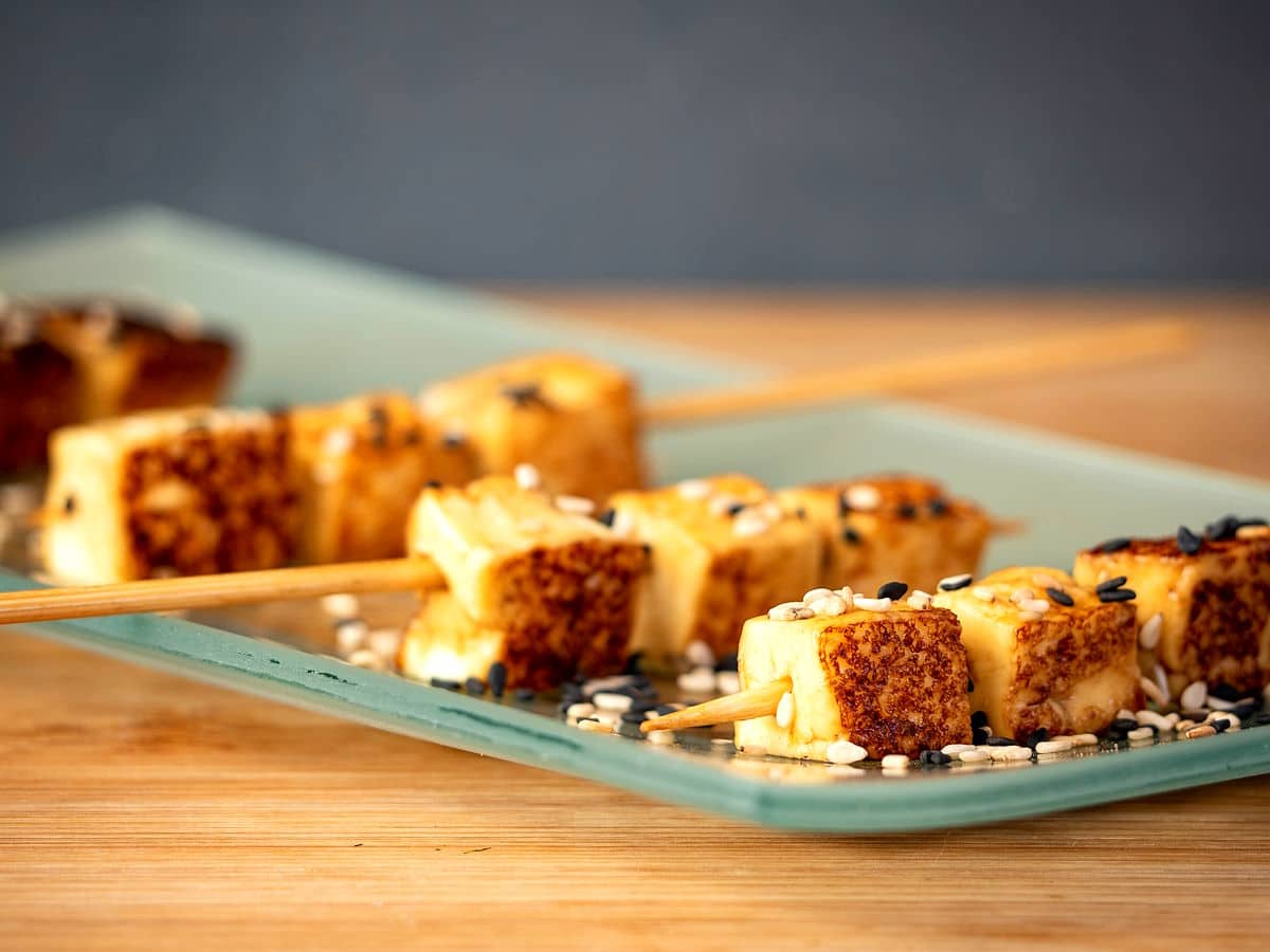 Fried tofu on serving plate.