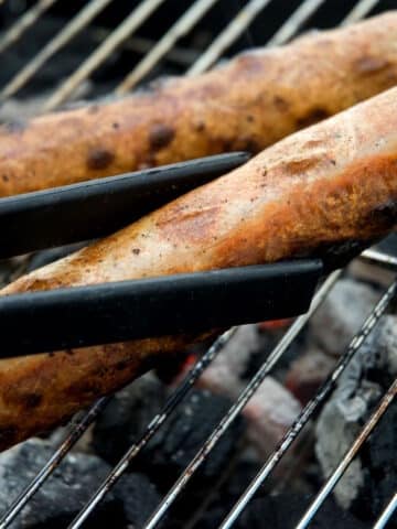 Bratwurst sausages on the grill.