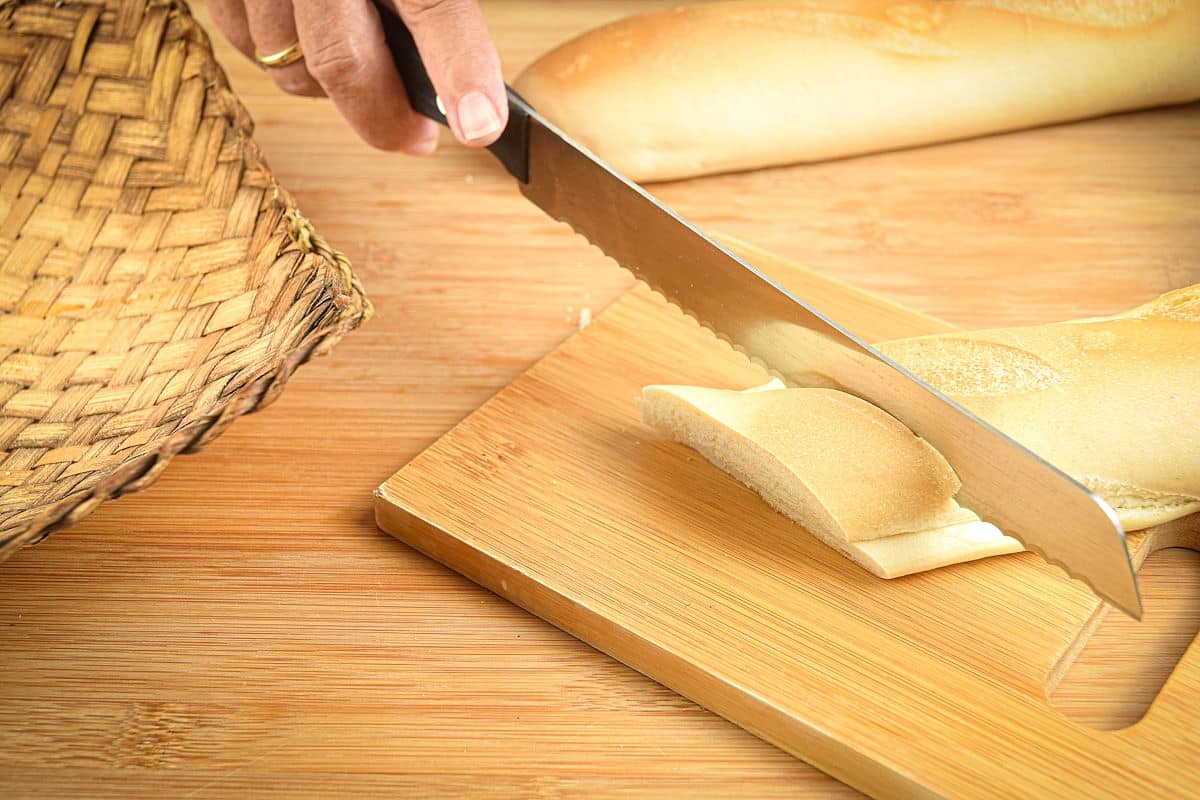 French bread on cutting board.